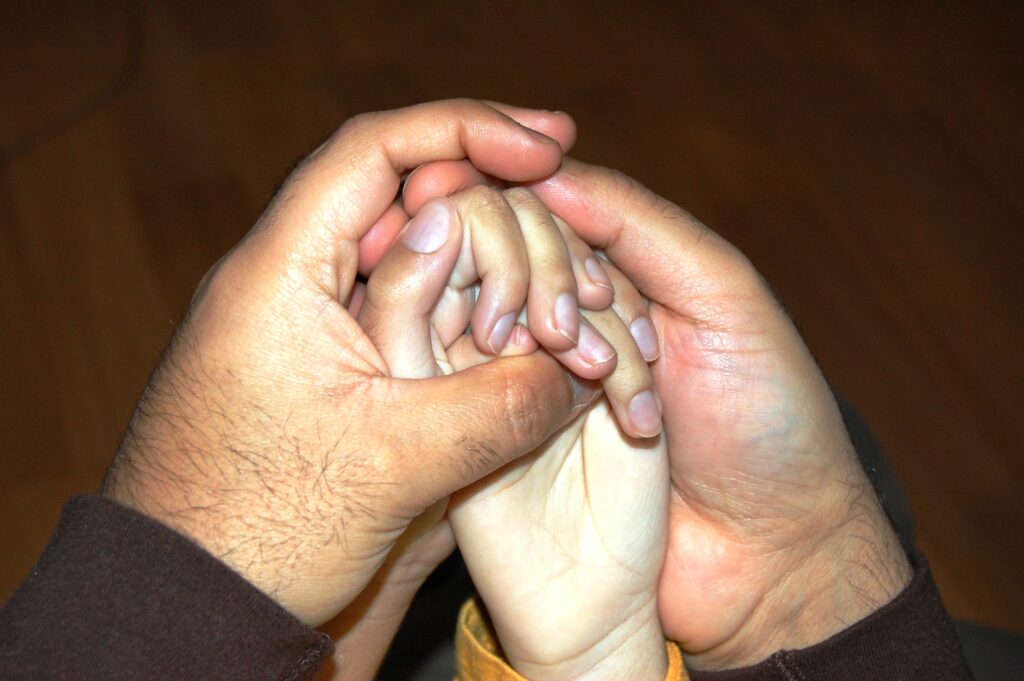 Family holding hands